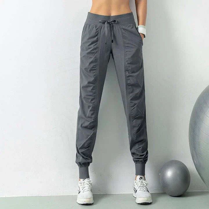 Comfortable and versatile sports pants for active Kiwi women, featuring a relaxed fit, drawstring waist, and convenient pockets.