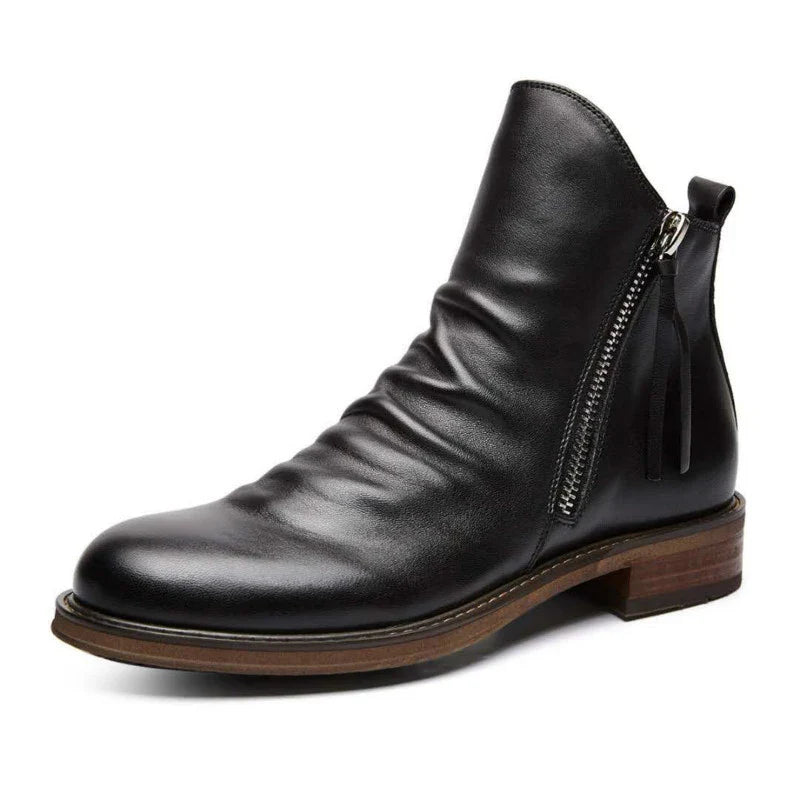 Premium Kiwi-crafted Chelsea boots with sleek, pointed toe and comfortable low heel for versatile casual wear