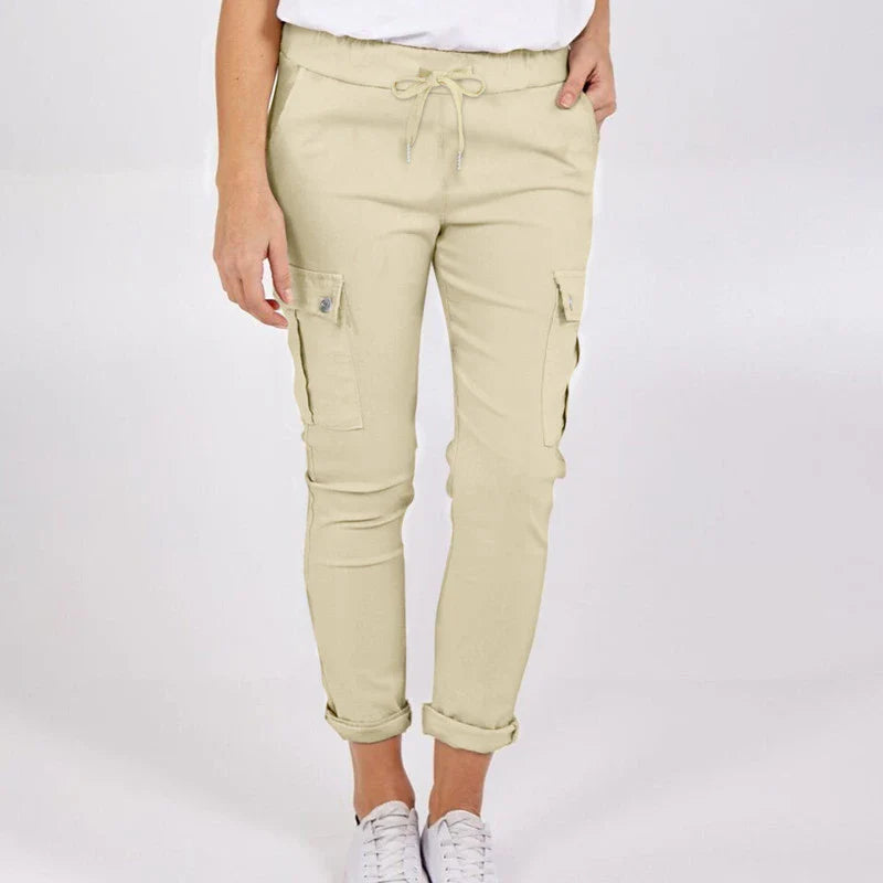 Stylish women's cargo pants with drawstring waist, pockets, and solid colour design