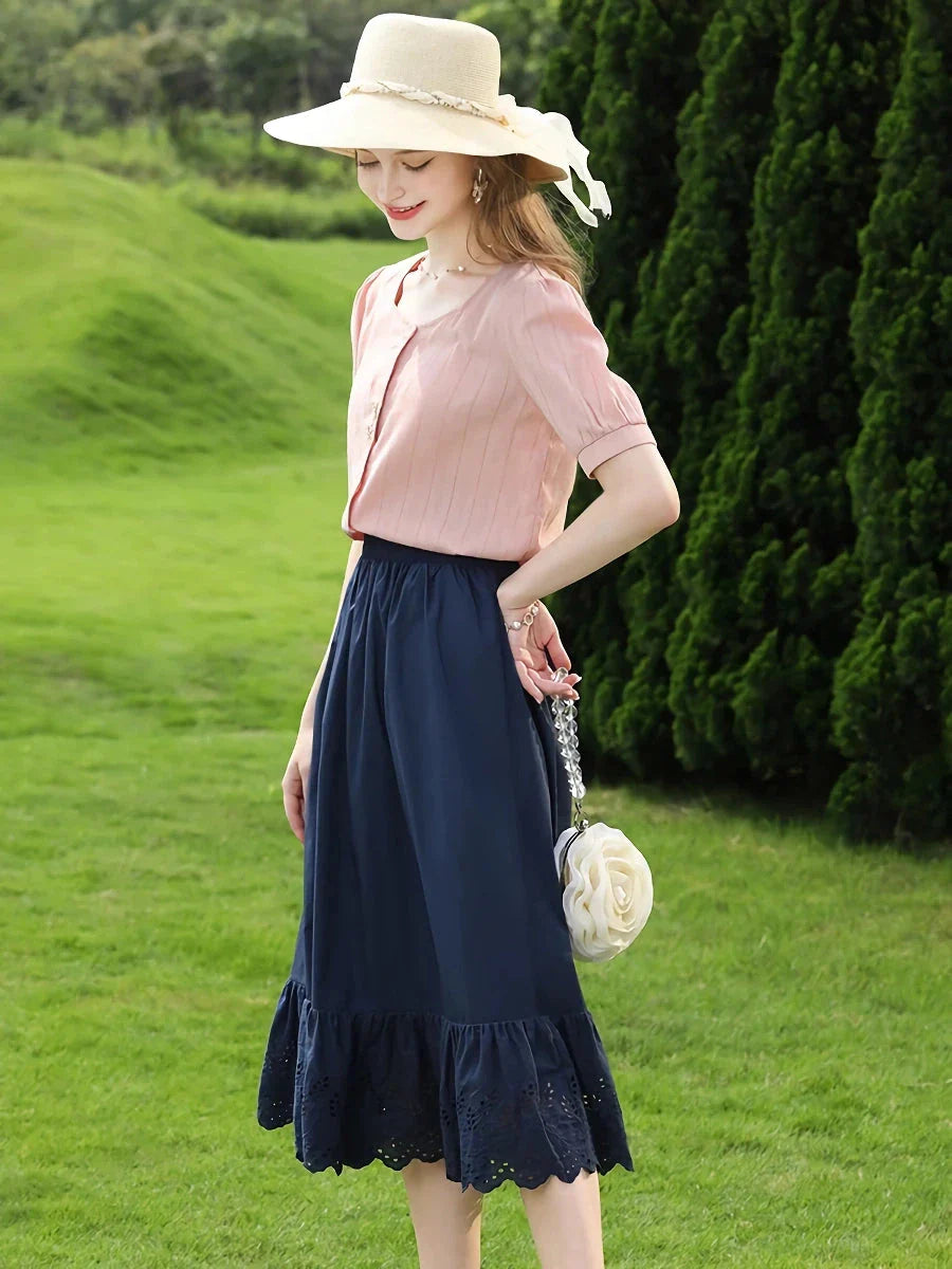 Elegant blue high-waisted A-line summer skirt with intricate lace patchwork details