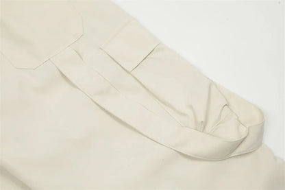 Stylish black overalls with pleated pockets, designed for the active Kiwi lifestyle