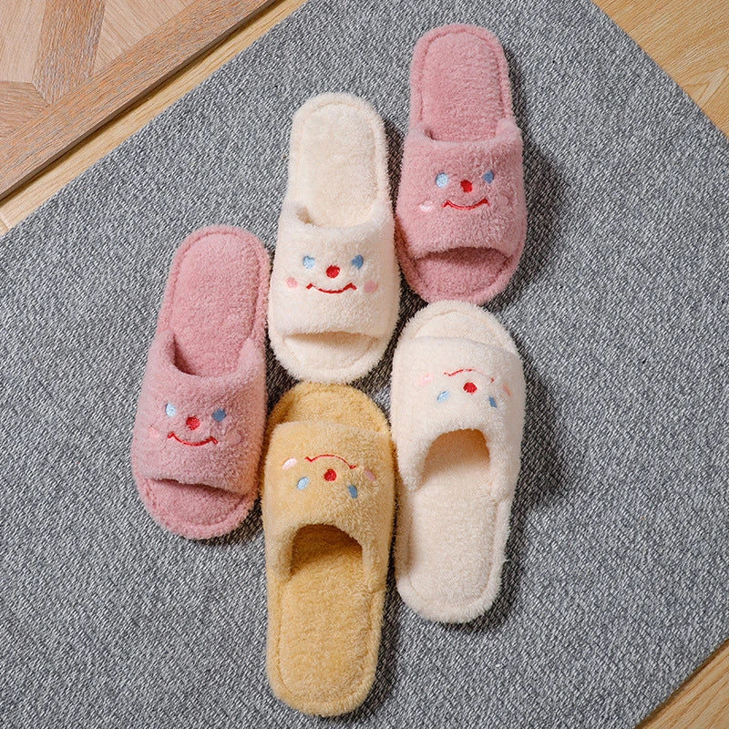 Cosy and cute smiling home slippers with plush upper and non-slip sole for Kiwi indoor comfort and style