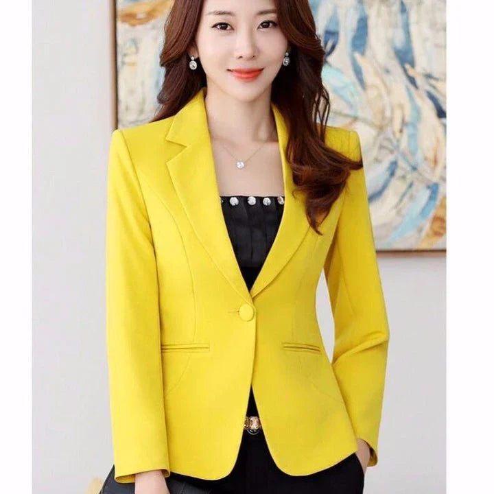 Stylish and breezy short suit jacket in a minimalist Korean-inspired design, made from high-quality polyester for lasting comfort and fashion-forward appeal.