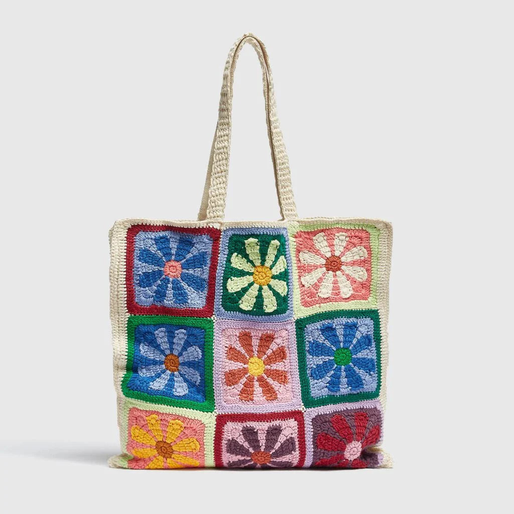 Stylish floral crochet shoulder bag with a bohemian flair, perfect for summer adventures in New Zealand