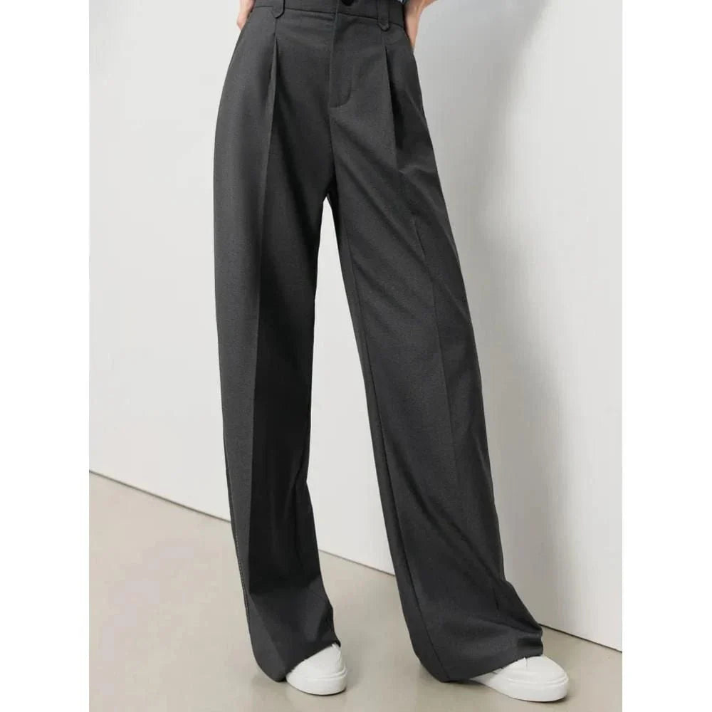 Versatile high-waist wide-leg grey trousers for Kiwi women, offering a chic and comfortable design.