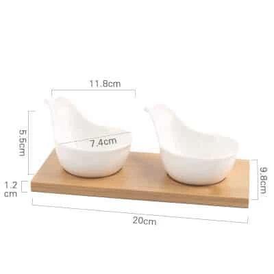 Stylish ceramic snack trays with natural wood pallet, perfect for serving nibbles and entertaining in Kiwi-style homes