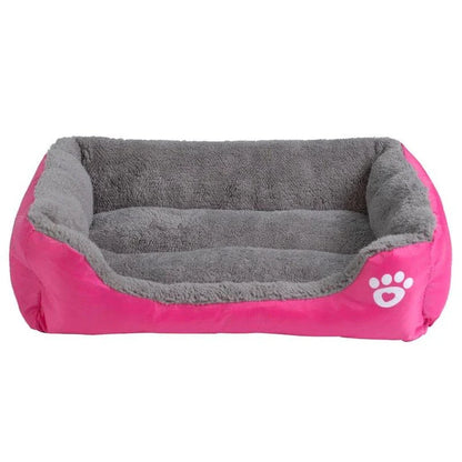 A cozy, waterproof pet bed featuring a soft fleece lining and paw print design, perfect for providing comfort and support for your beloved companion.