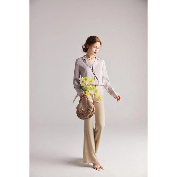 Elegant ruffled silk blouse in champagne color with V-neck design, suitable for professional or casual wear