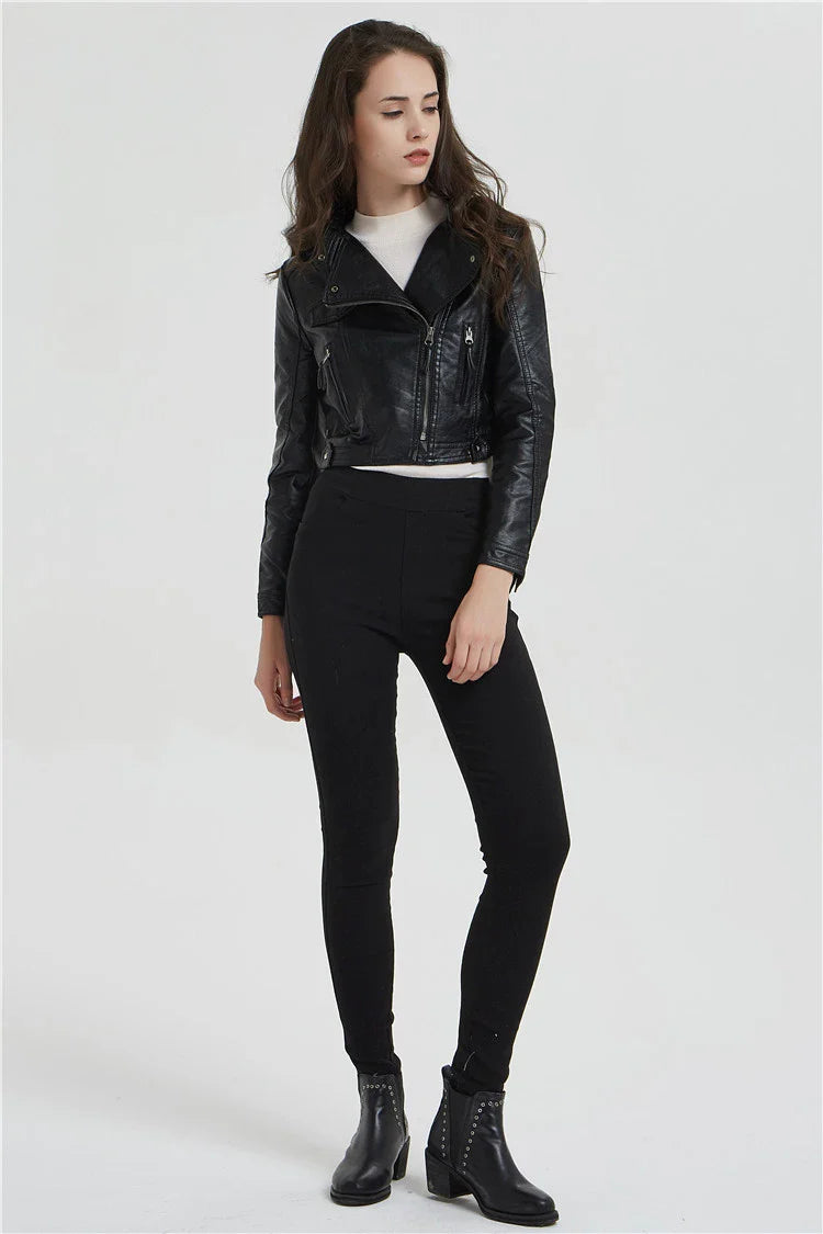 Trendha Women's Short Leather Jacket in Black, featuring a weathered finish and rivet detailing for a stylish, urban-inspired look