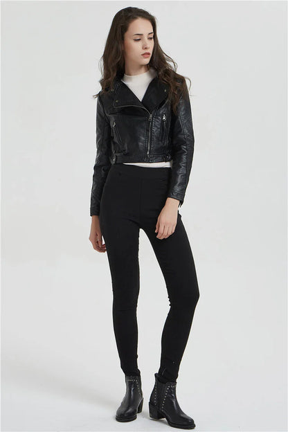 Trendha Women's Short Leather Jacket in Black, featuring a weathered finish and rivet detailing for a stylish, urban-inspired look