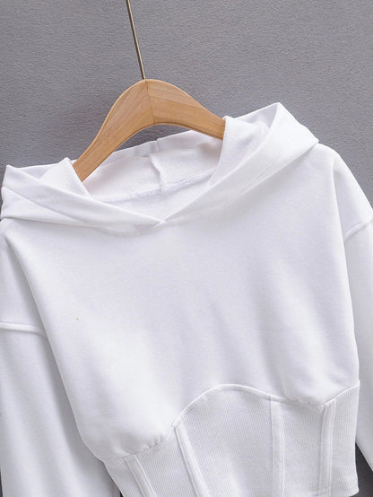 A slim-fit hooded jumper in white with a distinctive navel accent, a must-have Kiwi streetwear style.