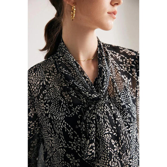 Elegant black printed silk blouse with a stylish bow collar, featuring a straight cut and puff sleeve design for a sophisticated and flattering look.