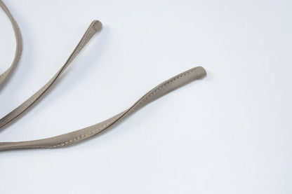 A stylish one-shoulder top and drawstring skirt set made from premium milk silk fabric, perfect for elevating your casual wardrobe.