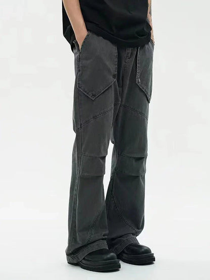 Black washed micro-flared trousers with pleated design and large pockets, perfect for the modern Kiwi lifestyle