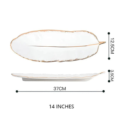 Elegant feather-shaped ceramic storage tray in white with hand-painted designs, perfect for serving, organizing, and decorating your Kiwi home