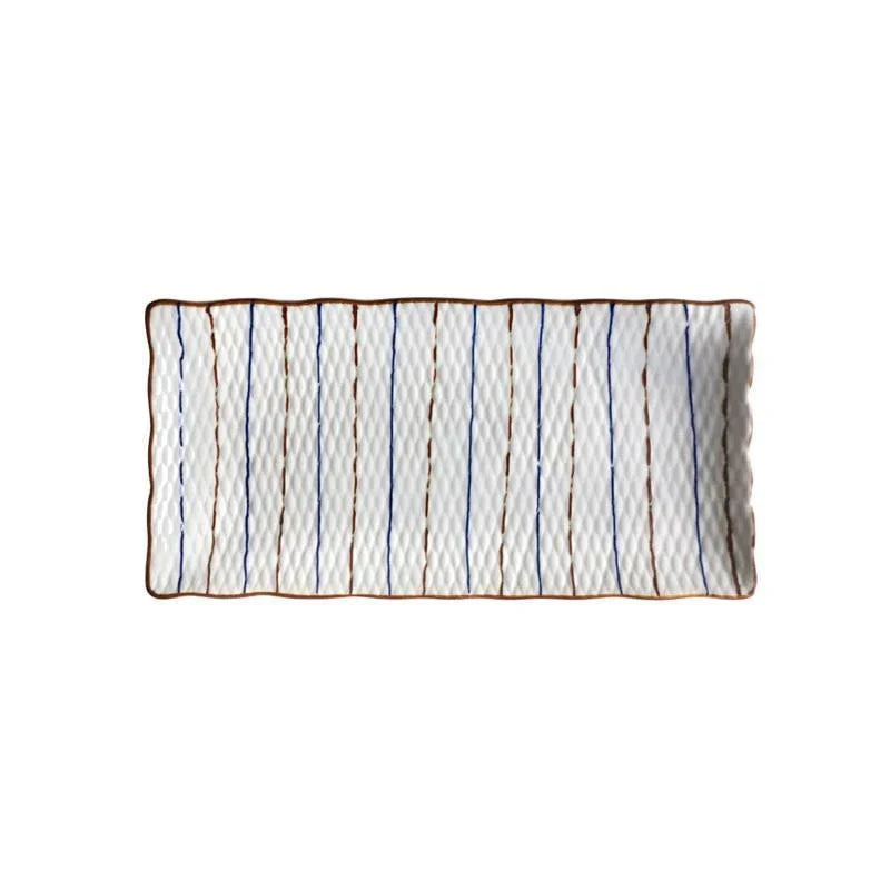 Beautifully crafted Japanese-inspired ceramic plate with a blue and orange glazed finish, perfect for Kiwi homes