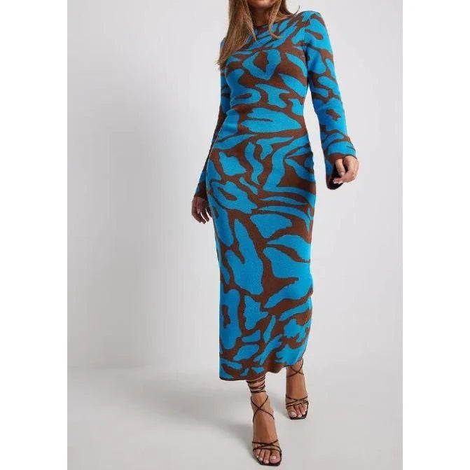 Elegant striped knit midi dress with O-neck design, featuring a flattering slim fit and comfortable ankle-length cut for the modern Kiwi woman.