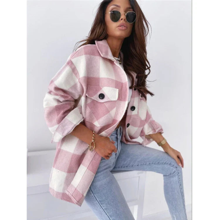 A cosy, plaid woolen jacket with a relaxed, oversized fit and premium New Zealand wool construction