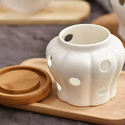 Stylish white ceramic garlic storage jar with wooden lid, designed for modern Kiwi kitchens