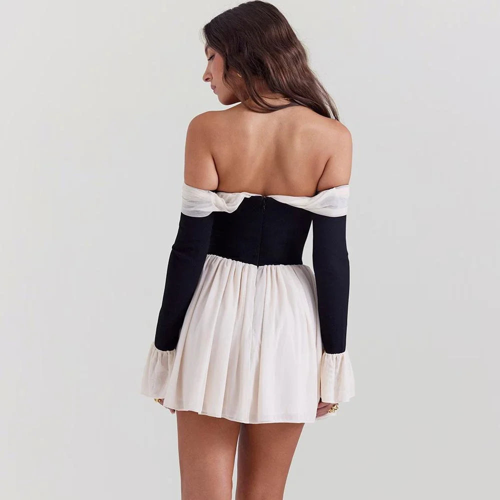 Stylish strapless backless mini dress with flared sleeves in a patchwork design, perfect for a night out in New Zealand