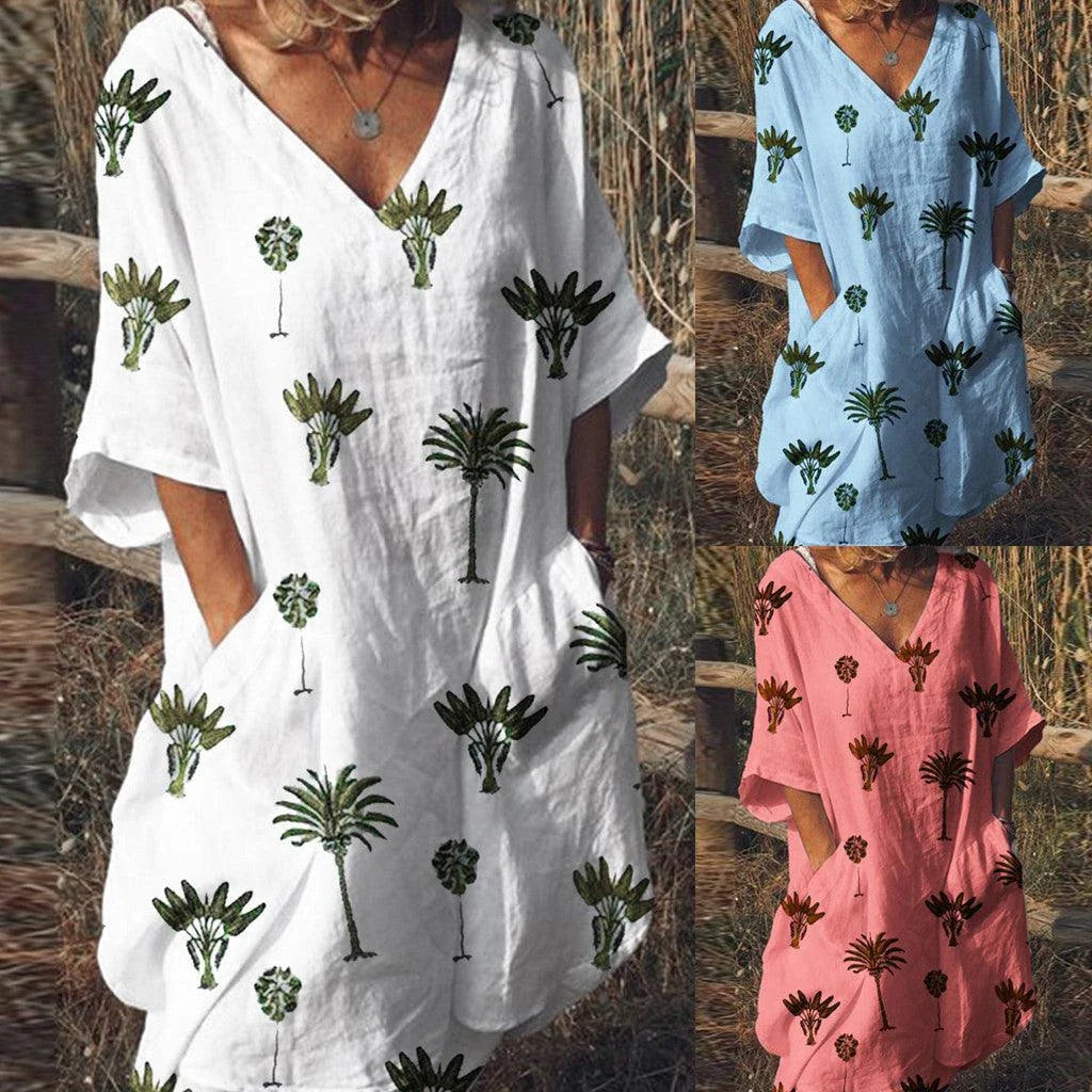 Vibrant leaf print casual dress with V-neck and flared silhouette, perfect for the Kiwi lifestyle