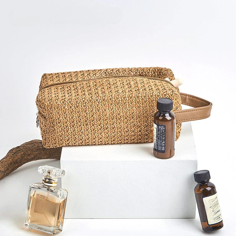 A stylish and practical cosmetic bag made from eco-friendly straw material with a unique knitting pattern, designed for the modern Kiwi woman.