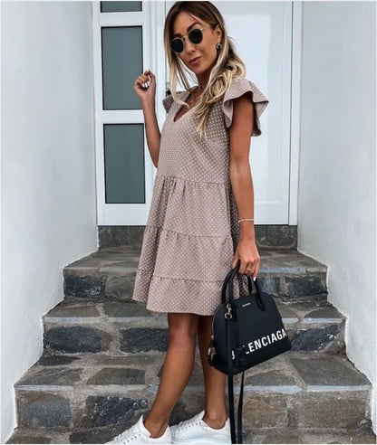 Vibrant digital print V-neck dress with ruffled detailing and flowing silhouette