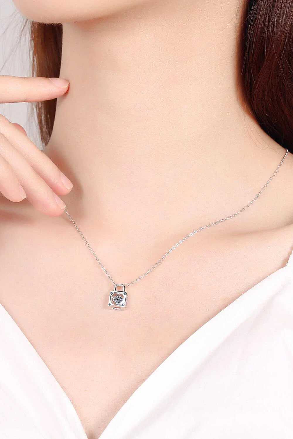 Elegant Moissanite Lock Pendant Necklace with 925 sterling silver, moissanite centre stone, and zircon accents