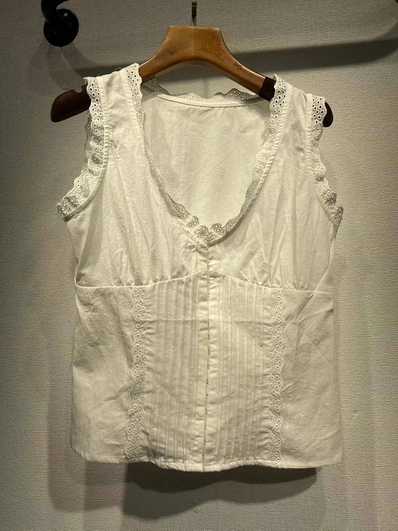 A stylish embroidered lace tank top with a sweet u-collar neckline, made from premium Kiwi-grown cotton.