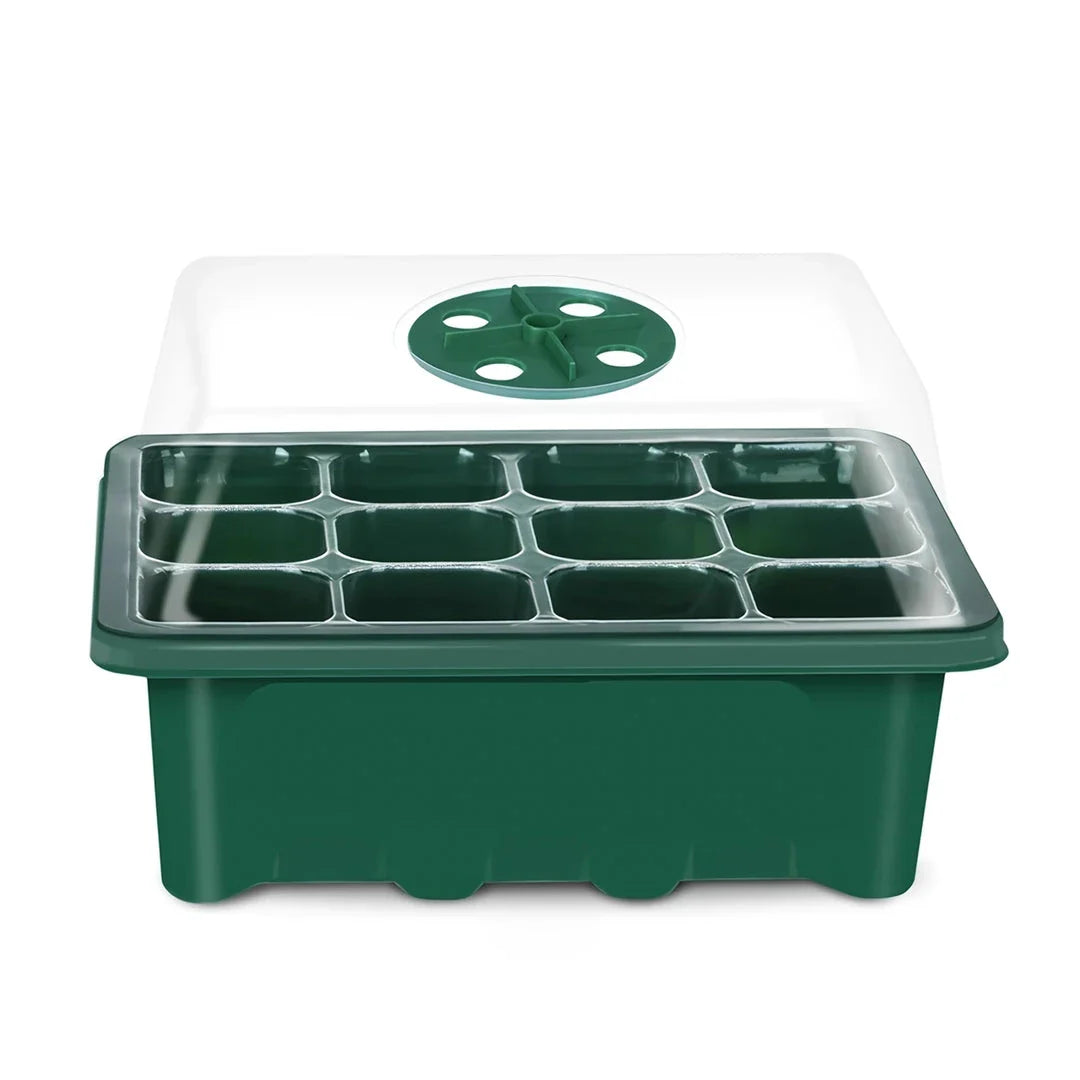 A transparent 12-cell seedling tray with a humidity dome and drainage holes, perfect for growing a variety of plants from seeds.