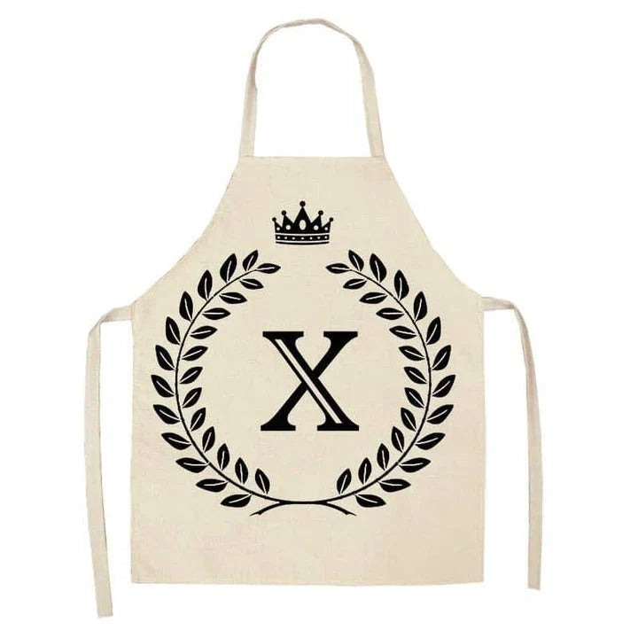 A crown and letter printed kitchen apron made of high-quality cotton and linen, suitable for both men and women in New Zealand kitchens.