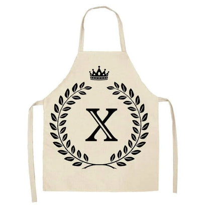 A crown and letter printed kitchen apron made of high-quality cotton and linen, suitable for both men and women in New Zealand kitchens.