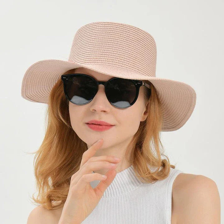 Elegant ladies' summer beach sun hat with wide brim, designed for sun protection and style in New Zealand