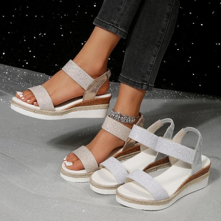 Sparklin' Kiwi Wedge Sandals with a glittery upper, wedge heel, and secure buckle closure