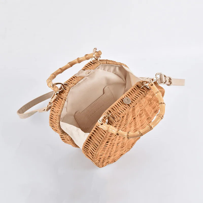 Rattan straw bag with intricate three-dimensional conch shell design, ideal for everyday use and a touch of coastal chic