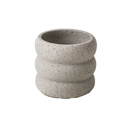 Stylish modern minimalist cement flower pots in two sizes, perfect for showcasing plants and greenery in a Kiwi home
