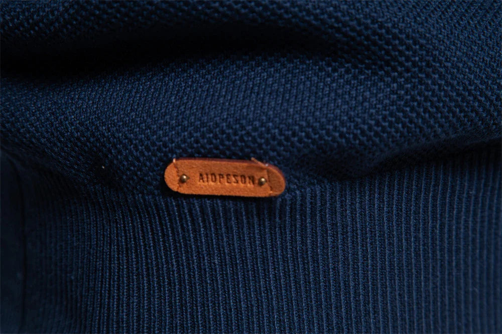 A stylish, slim-fit sweater in a modern colour-blocking design of Lake Green, White, and Grey, made with premium cotton for exceptional comfort and New Zealand casual style.