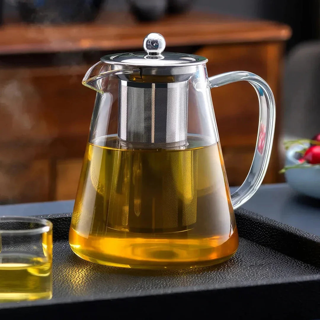 Elegant glass teapot set with stainless steel infuser, perfect for brewing and enjoying a variety of teas