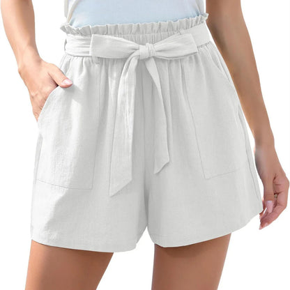 Stylish high-waisted ruffle bow shorts in black, perfect for Kiwi summer beach and casual wear