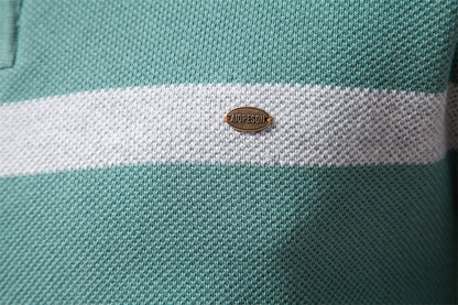 A stylish, slim-fit sweater in a modern colour-blocking design of Lake Green, White, and Grey, made with premium cotton for exceptional comfort and New Zealand casual style.