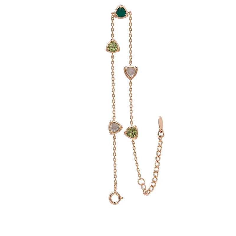 A beautiful, eco-friendly bracelet featuring natural green gems in a modern geometric design