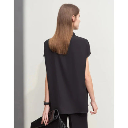 Minimalism Summer Solid Women's Blouse in Blue, featuring a loose swing neck, tie sleeves, and hollow-out decoration for a chic, breathable summer office look.