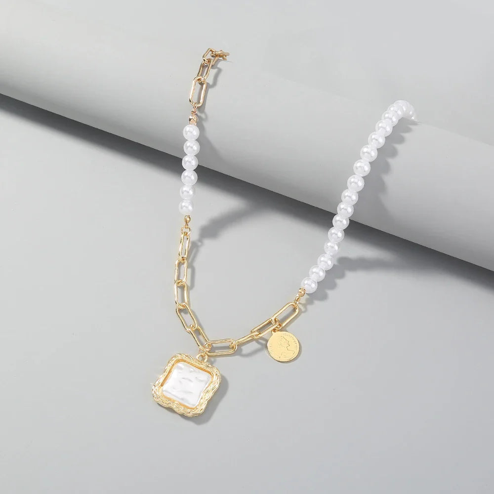 A beautiful faux baroque pearl necklace with an adjustable length and a polished, vintage-inspired design