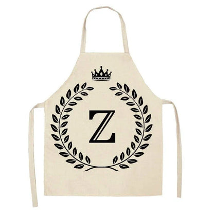 A crown and letter printed kitchen apron made of high-quality cotton and linen, suitable for both men and women in New Zealand kitchens.
