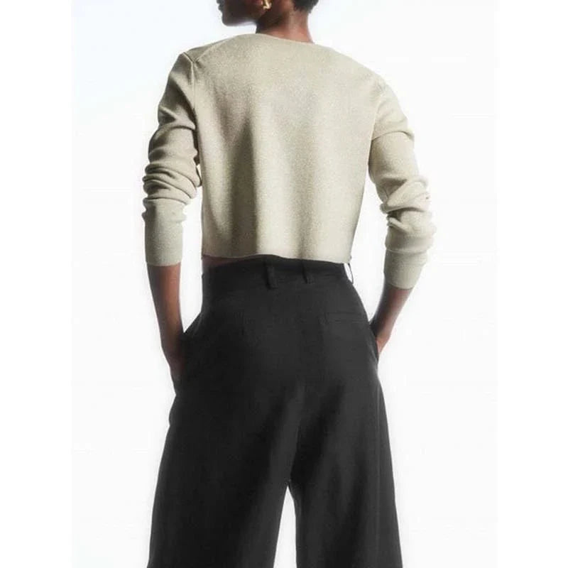 Stylish V-Neck Merino Wool Cardigan in a classic solid color, perfect for layering during the Kiwi winter season.