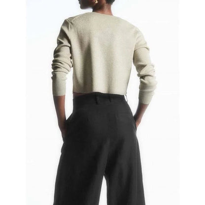 Stylish V-Neck Merino Wool Cardigan in a classic solid color, perfect for layering during the Kiwi winter season.