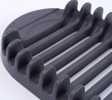 A modern, gray dish drying rack with convenient storage space for kitchen essentials, designed to declutter and streamline your Kiwi kitchen