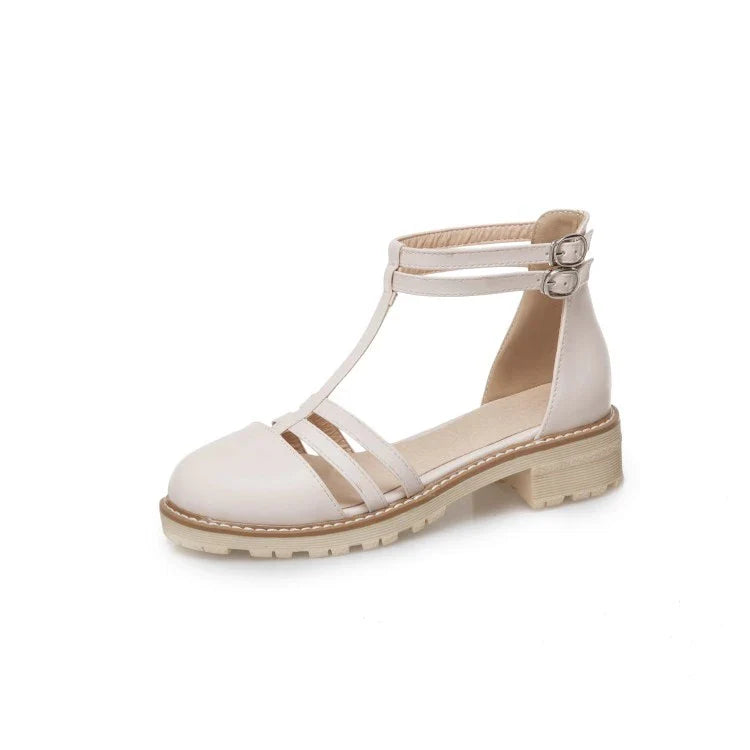 Stylish flat-bottomed buckle sandals in pink, suitable for warm-weather wear in New Zealand