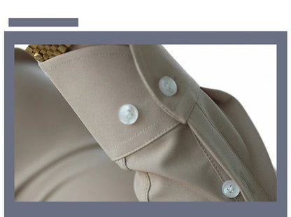 A stylish and versatile Italian-collared shirt for young New Zealand men, made from high-quality polyester fabric.