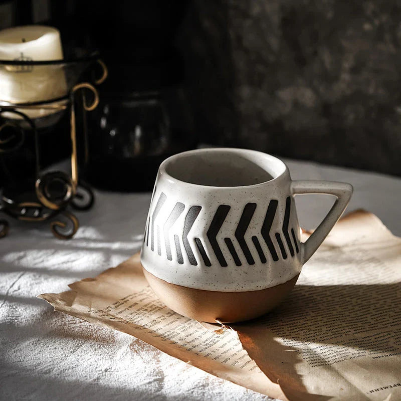 Stylish hand-painted ceramic mug with unique floral, geometric, or abstract designs, perfect for elevating your daily beverage experience.